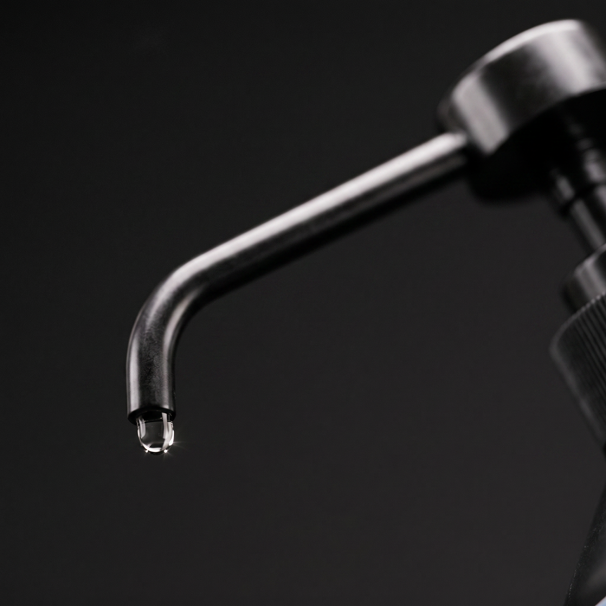 COBALT liquid pump dispensing a glycerol droplet - macro